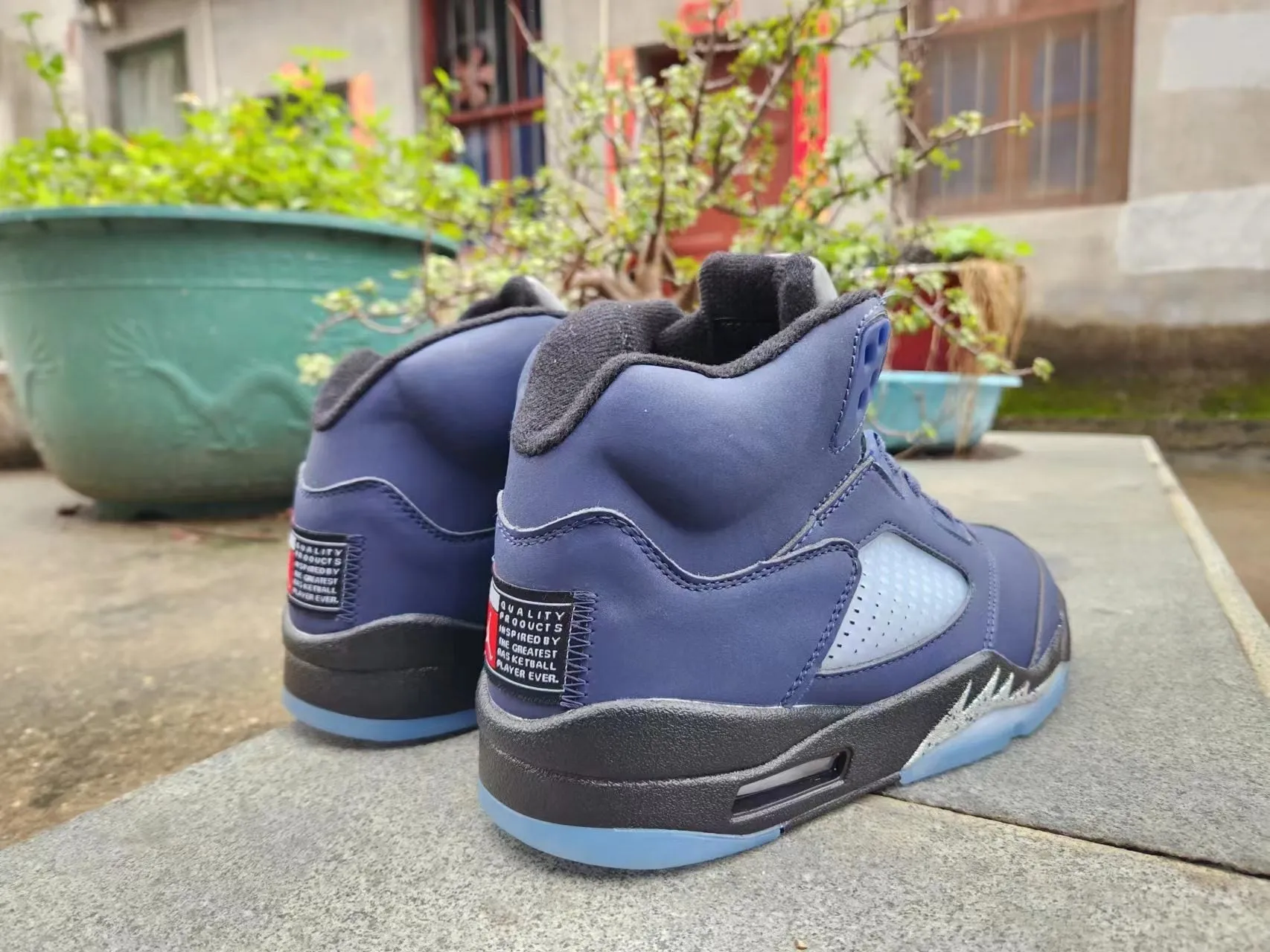 black Sleek and smooth blue and Jordan 5 Customer-first