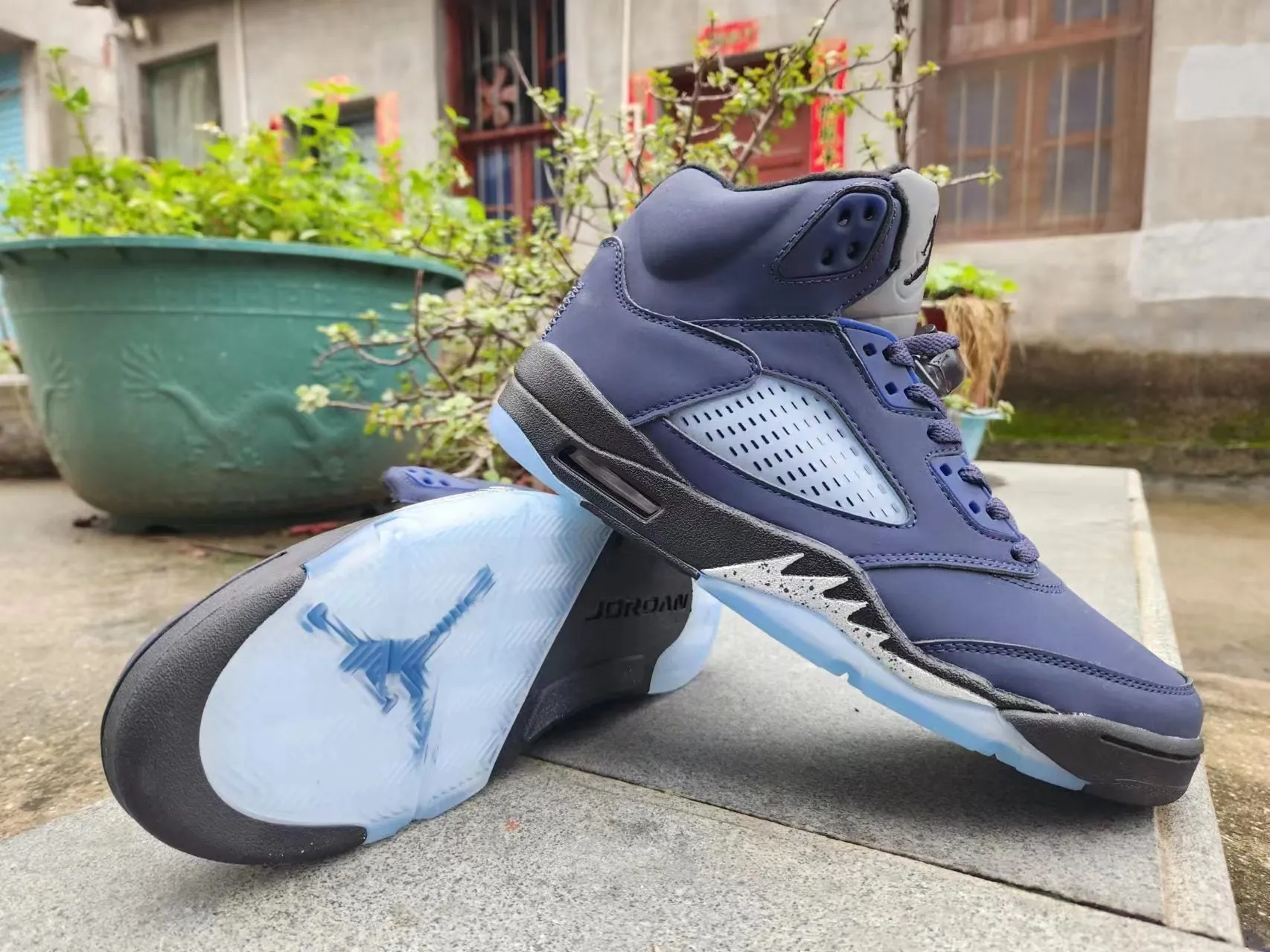 black Sleek and smooth blue and Jordan 5 Customer-first