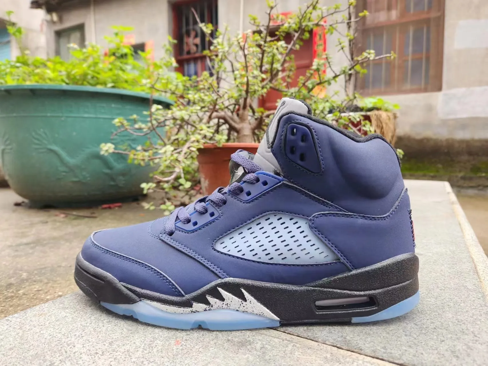 black Sleek and smooth blue and Jordan 5 Customer-first